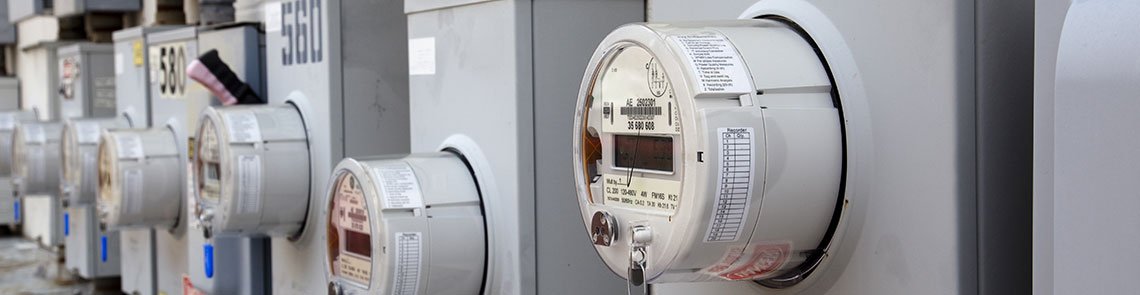 Image of electric meters on the side of a building