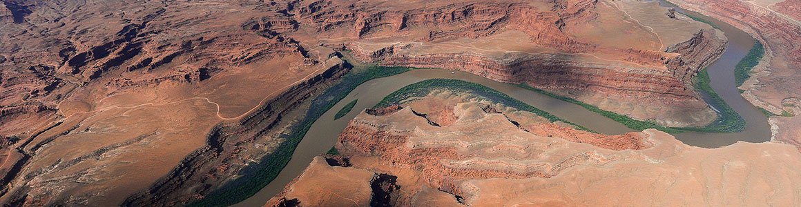 Image of river snaking through a red rock desert