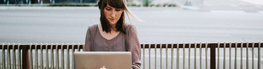 image of a woman on a laptop