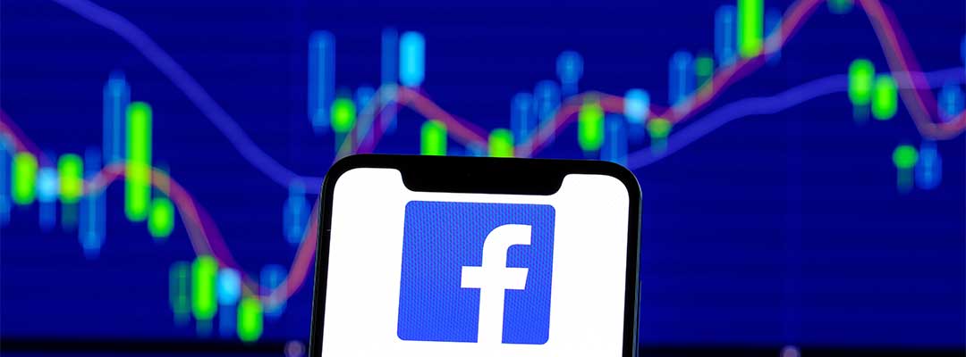 facebook logo with stock ticker behind it