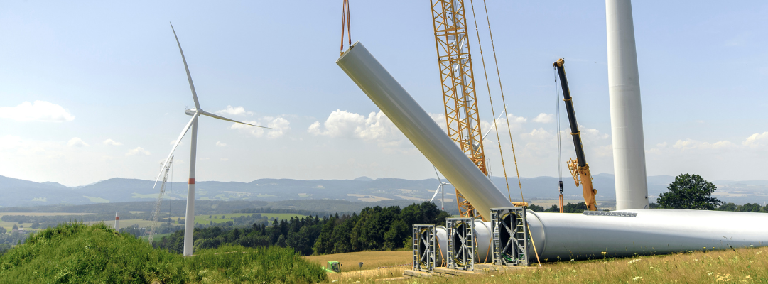 Building and assembling a construction windmill by a crane