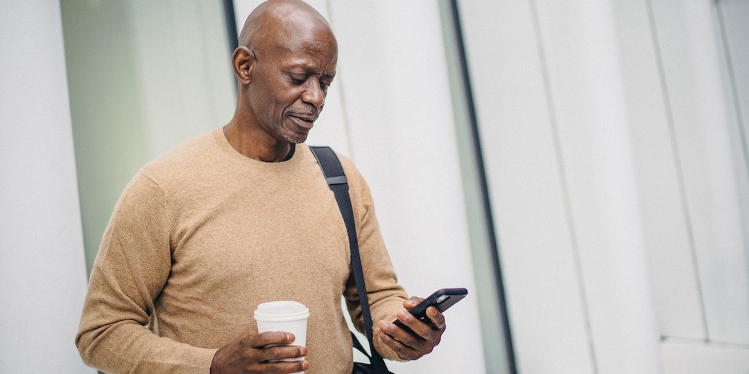 A man looking at his phone